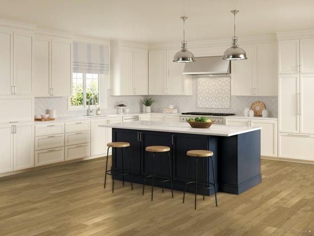Kitchen with medium brown maple hardwood floors.